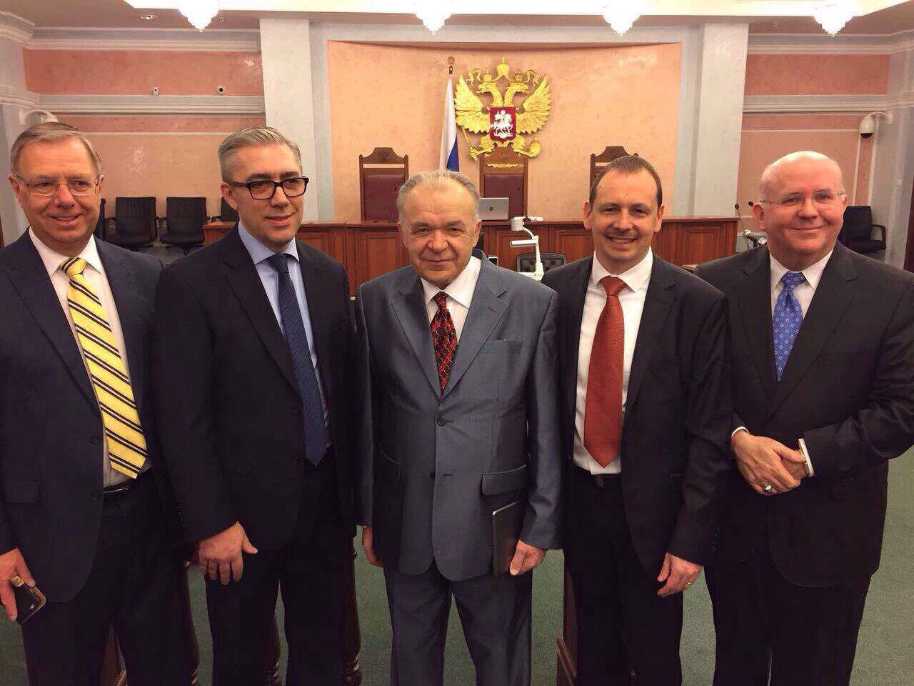 Congregation members gathering at the Kingdom Hall